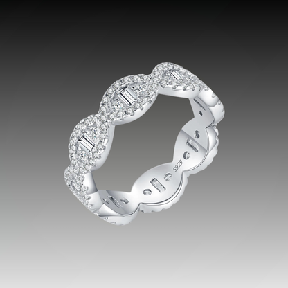 Silver eternity band with scalloped edges and baguette-cut cubic zirconia accents


