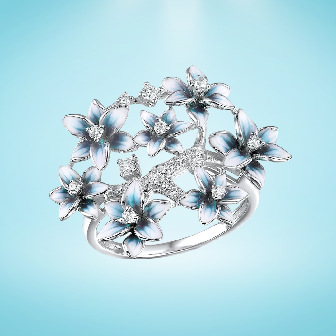 Silver ring with blue and white enamel hydrangea flowers and sparkling stones

