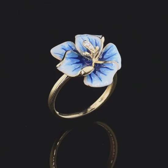 Gold-plated ring with hand-painted blue and white enamel flower and crystal accents

