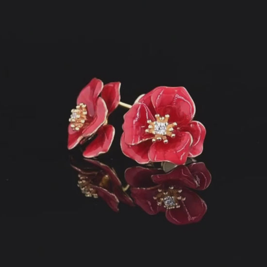 Pair of red enamel flower stud earrings with golden stamens and central clear stones, Rosa Rossa from the Rossa Collection.

