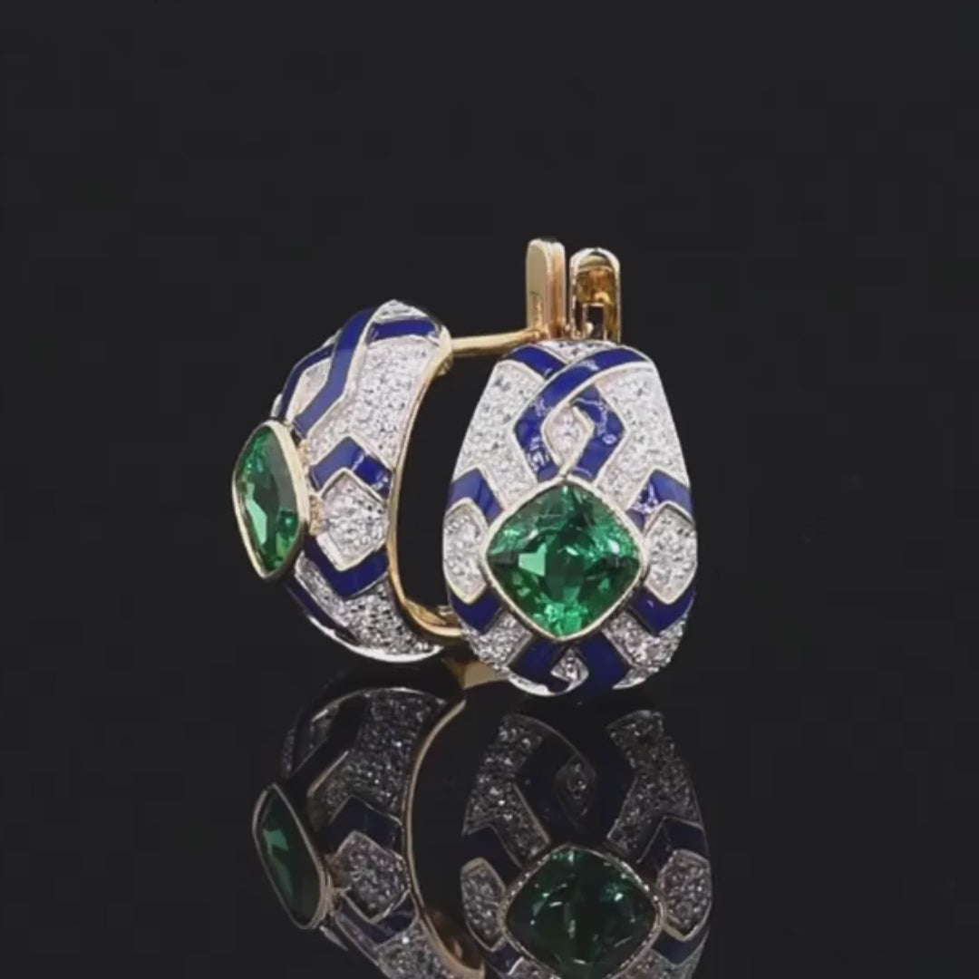 Gold and silver oval earrings with green cushion-cut stones, navy enamel, and geometric patterns

