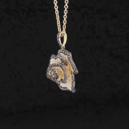 Pendant shaped like a rose with pavé detailing in brown, yellow, and white stones


